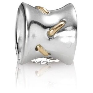 EUC Pandora 790327 Sterling Silver w/ 14k Yellow Gold Stitches Charm